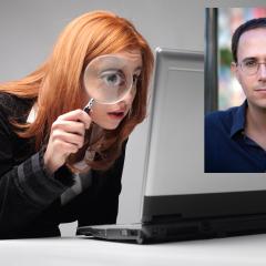 אילוסטרציה: אישה מסתכלת במחשב בזכוכית מגדלת